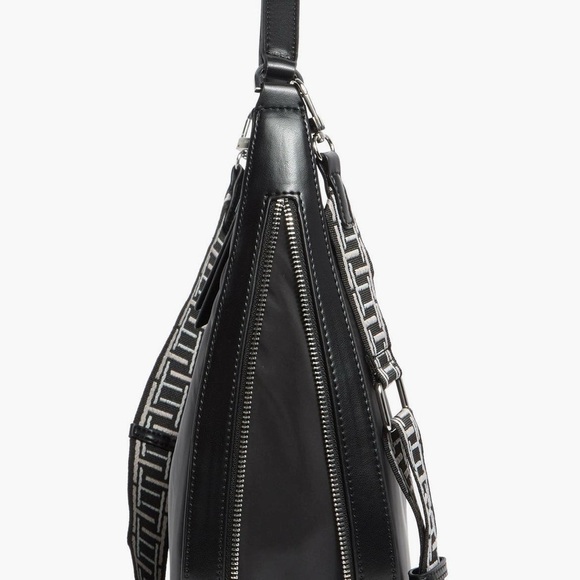 Tahari
Minetta Expandable
Crescent Bag NWT - Picture 4 of 6